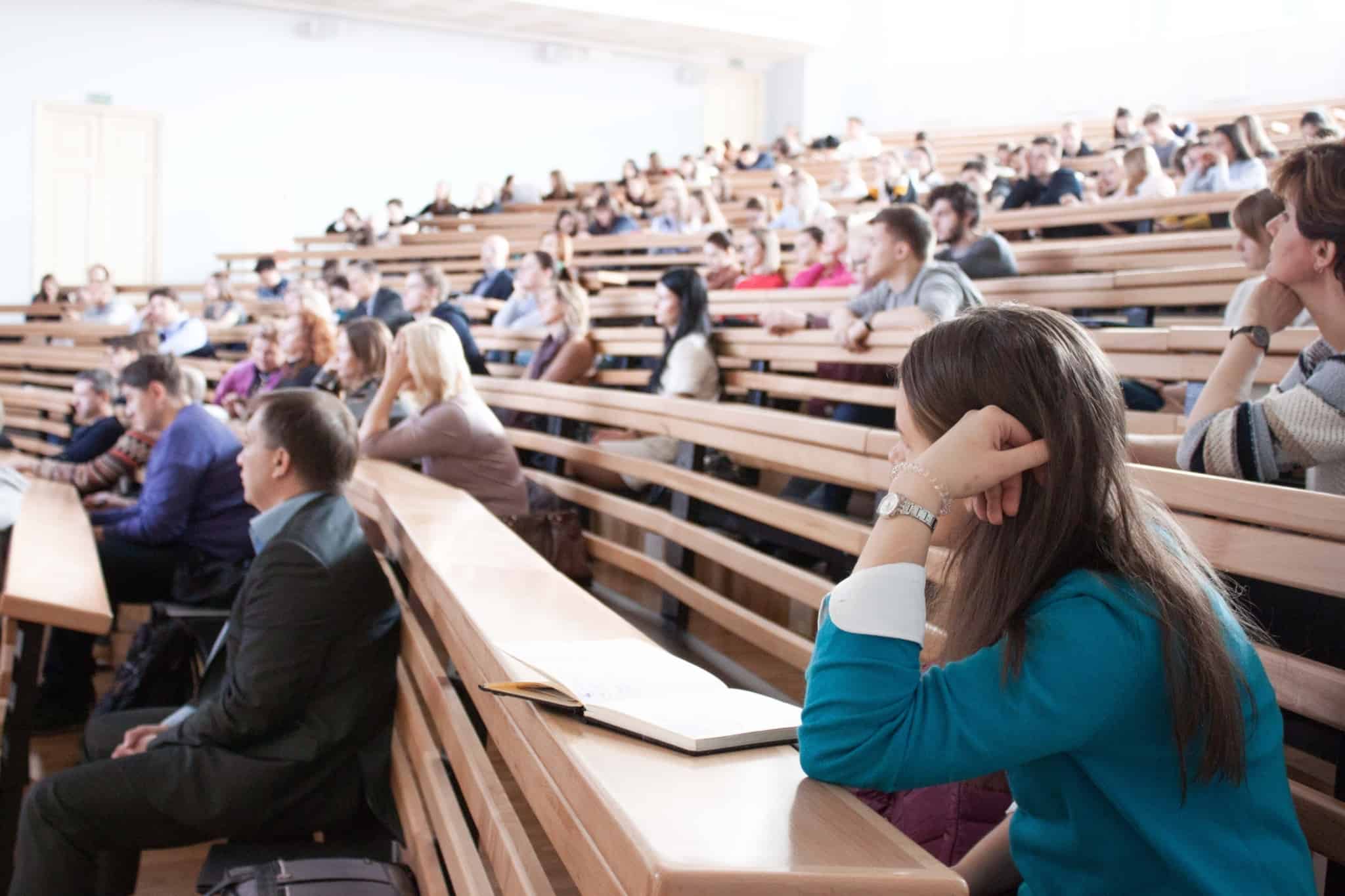 students in college auditorium