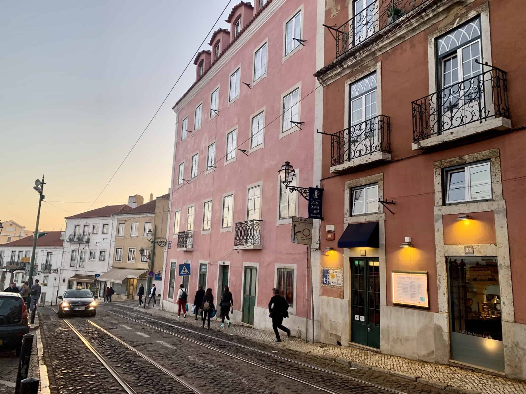 Row of buildings on a street in Lisbon.  Home prices are on the rise again in 2021